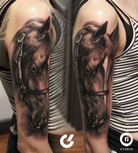 If you are looking for tattoo designs that you can make your own and that have symbolic meaning, a horse head tattoo might be the one for you. Black and grey horse head tattoo on the right upper