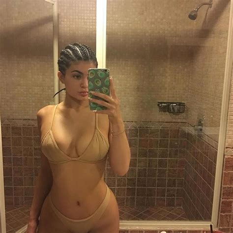 Kylie Jenner Bares It All In Yellow Lace Bra After Her