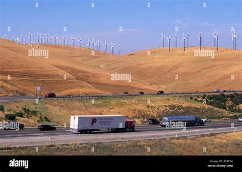 Usa California Altamont Pass With Windmills And Highway Traffic Stock