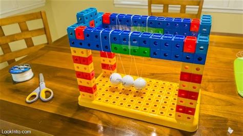 Learn how to make a simple newton's cradle, the classic science project demonstrating momentum! DIY Kid Friendly Newtons Cradle - Home