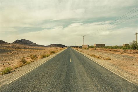 Empty Desert Road Photograph By Polychronis Giannakakis Pixels