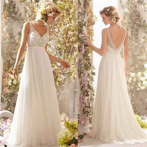 There are high low beach wedding dresses, simple flowy dresses, all. New Arrival Heavy Beaded Bodice Backless Flowy Bridal Gown ...