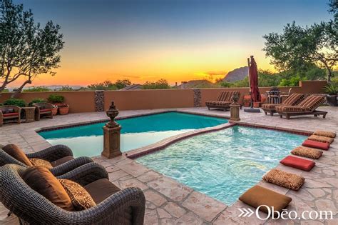 Master bedroom with private bath second bedrrom/den also with bath. An Arizona pool sunset to die for. Check out our board ...