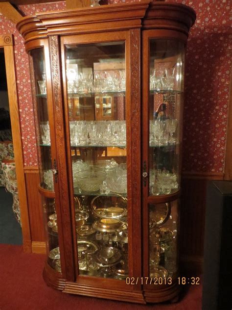 Mirrored curio cabinets create an illusion of a larger space with their reflection. LargeWood and Glass Pulaski Curio Cabinet Pseudo Early ...