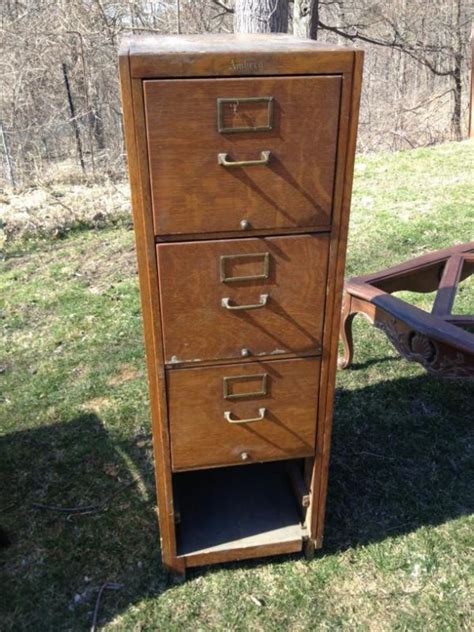 This file cabinet cam lock is located in the middle of the drawer. File Cabinet Turned Mud Room Bench | Hometalk