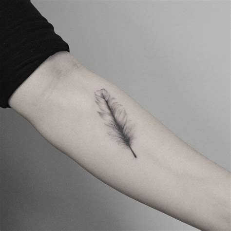 Single Needle Feather Tattoo On The Left Inner Forearm