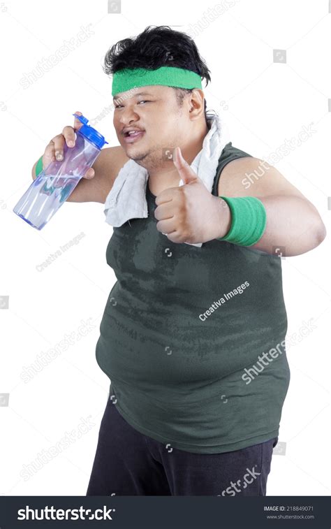 Overweight Man Drinking Water While Showing Stock Photo 218849071