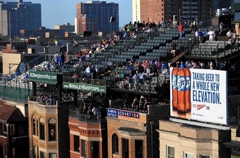 Cubs Owner Ricketts Buys Wrigley Rooftop Buildings Chicago Tribune