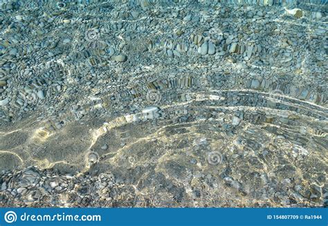 Clear Sea Water Texture Top View Of The Rocky Bottom Transparent
