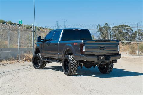 When Style Meets Truck Performance Customized Black Lifted Ford F 250