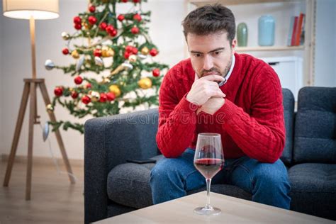 Lonely Man Celebrating Christmas And Drinking Alone Stock Image Image