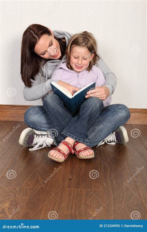 Mother Teaching Daughter To Read Home Education Royalty Free Stock
