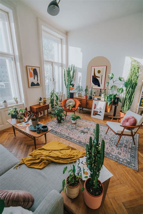 Artful Bright Interior With Modern Art Plants And Retro Furniture