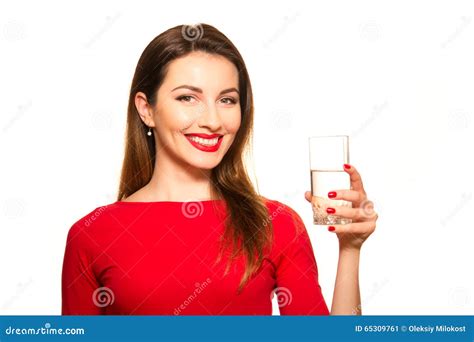 Beautiful Girl Drinking A Glass Of Pure Water Smiling Stock Image