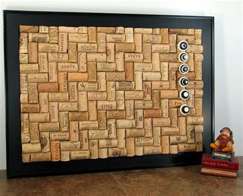 A Cork Board With Several Different Types Of Wine Corks On It And A