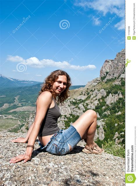 Girl Sitting On A Rock Royalty Free Stock Images Image