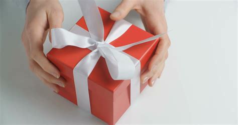 ✓ free for commercial use ✓ high quality images. Female hands open a red gift box. Closeup shot. Stock ...