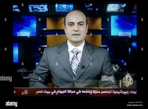 Tv Screen Shot Of A News Anchor Broadcasting Live On Al Jazeera Also