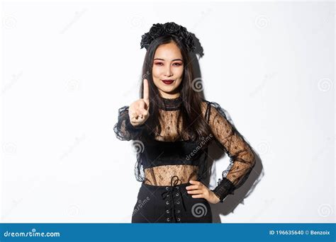 Image Of Sassy Young Beautiful Asian Woman In Black Gothic Dress And