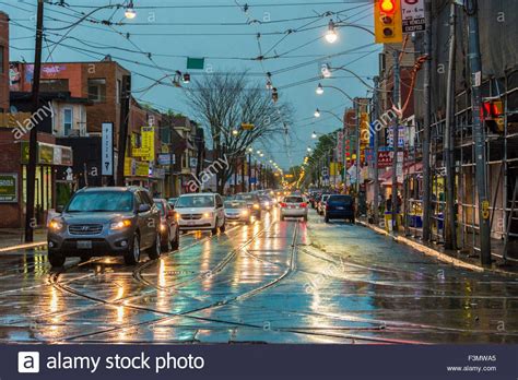 Download This Stock Image Wet Street With Cars Headlights