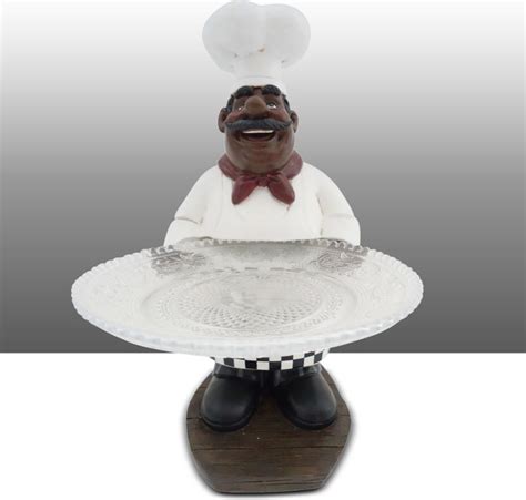 It is a fun novelty polyresin figurine with cork opener. Black Chef Kitchen Statue Holding Glass Plate Table Art Decor - Traditional - Dining Tables - by ...