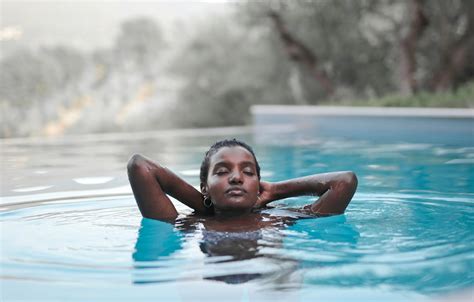 Young Woman Emerging From Water · Free Stock Photo