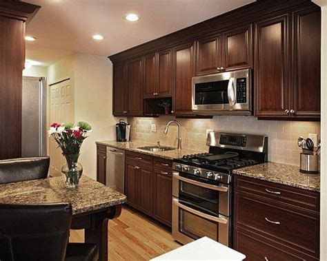 Hardwood is what you use for cabinet face frame, cabinet doors, even trim. Dark Wood Kitchen Cabinets | Dark wood kitchen cabinets ...