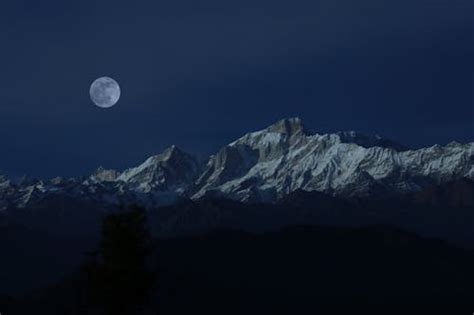 Crescent Moon Over Snow Mountain · Free Stock Photo