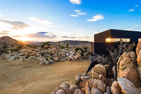 Stunning Silhouette And Spectacular Landscape Define The Black Desert House