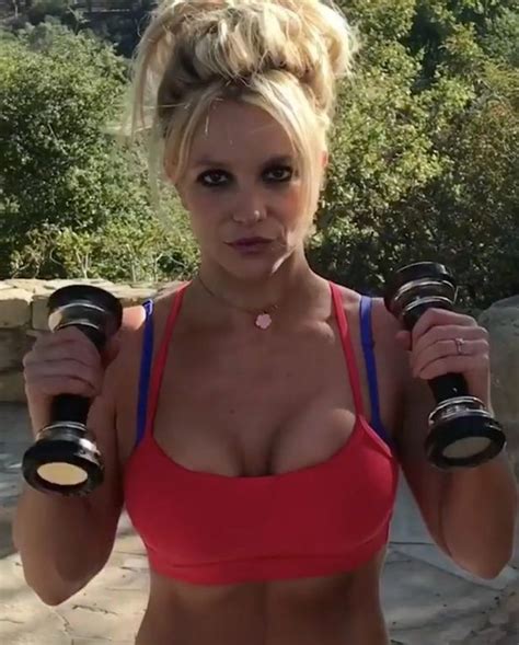 Britney Spears Boobs Burst Out Of Her Sports Bra As She Performs Seductive Workout In Her Back