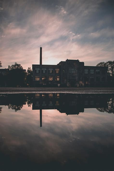 Building Reflected On Water · Free Stock Photo