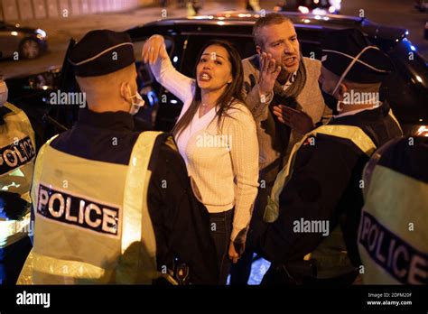 people argue with police forces as they are being fined french police forces officers conduct a