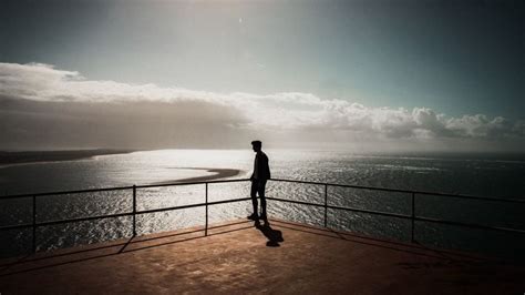Silhouette Loneliness Sea Sunset Setubal Portugal 4k Hd Wallpaper