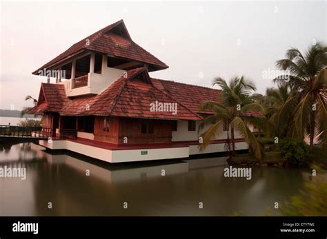 Tiled Roof House Surrounded By Water In Kerala South India Stock Photo
