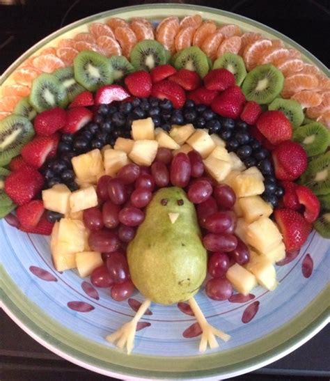 In a large bowl, beat cream cheese until fluffy. Fruit turkey for my raw vegan daughter … | Thanksgiving ...