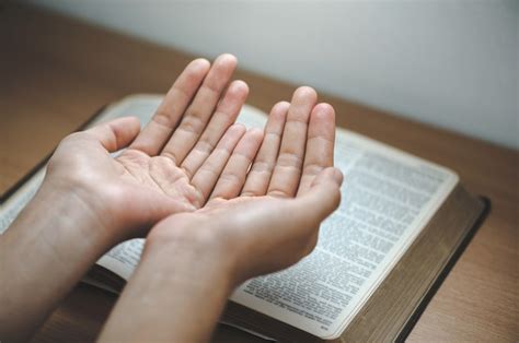 Premium Photo Hand Prayer On A Holy Bible In Church Concept For Faith