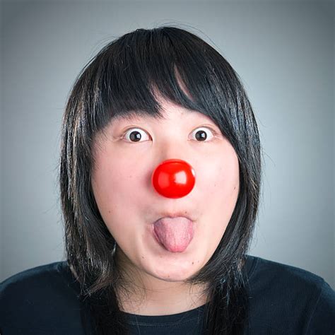 70 Young Clowns Sticking Tongues Out At Each Other Stock Photos