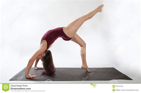 One Legged Wheel Pose Variation Stock Images - Image: 33113744