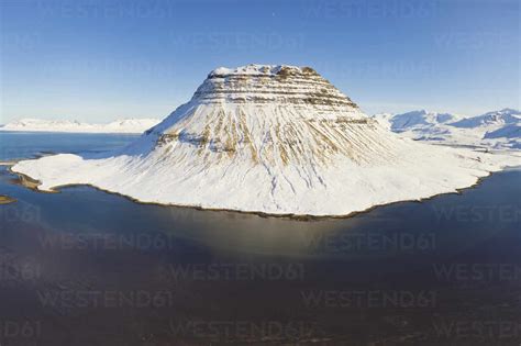 Aerial View Of Kirkjufell Mountain In Winter Covered With Snow