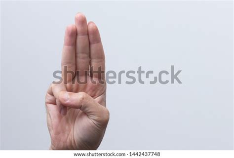 Hand Gesturing Three Finger Salute Signal Stock Photo Edit Now