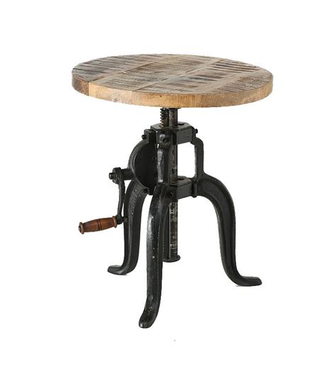 Featuring a tempered glass top this coffee table with adjustable height is a minimalistic proposition for contemporary interiors. Adjustable industrial round coffee table - Flexo Wadiga.com