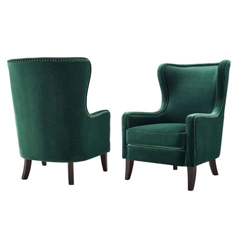 The chair sits on cherry stained cabriole legs. Steve Silver Rosco Modern Wingback Green Velvet Accent ...
