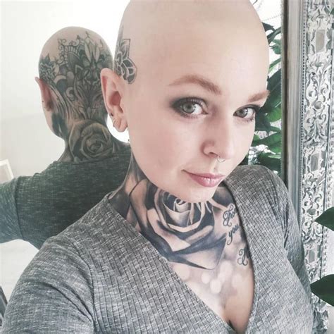 Bald Woman With Neck Tattoos