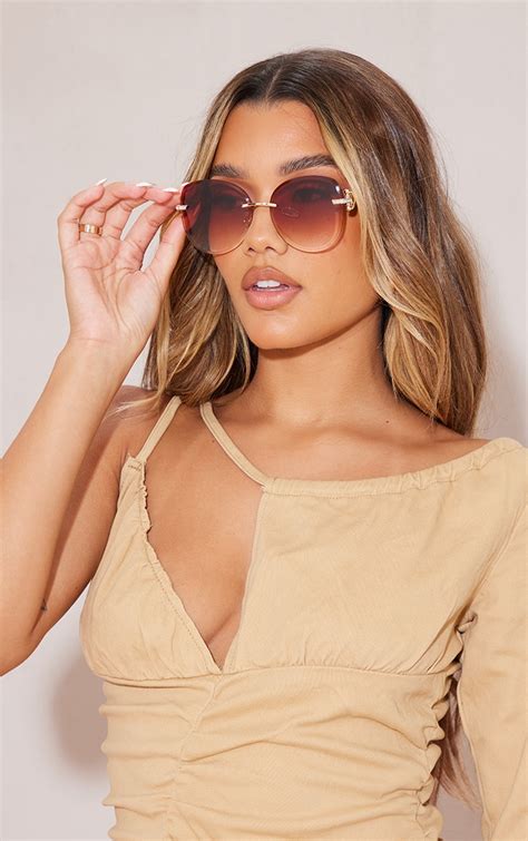 brown faded round frame frameless sunglasses prettylittlething usa