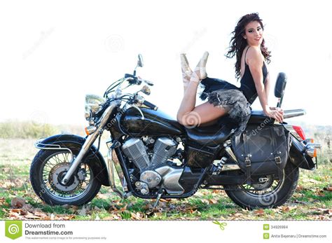 Use them in commercial designs under lifetime, perpetual & worldwide rights. Attractive Girl On A Motorbike Posing Outside Stock Images ...