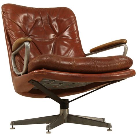 Great savings & free delivery / collection on many items. Leather Lounge Chair on Swivel by Strassle at 1stdibs