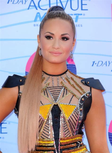 demi lovato nip slip wearing a partially see through little dress at 2012 teen c porn pictures
