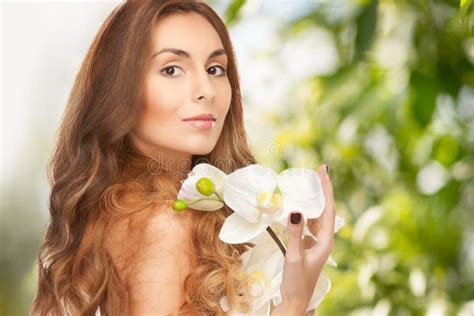Beautiful Woman With Orchid Flower Stock Image Image Of Attractive Beauty 38002555