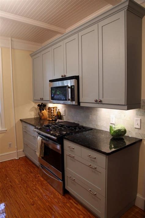 How much does it cost to paint kitchen cabinets, doors and more? like the cabinets, pask IKEA ones that have been painted ...