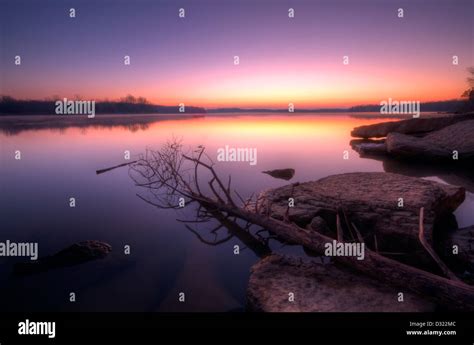A Beautiful Sunrise Over A Lake Stock Photo Alamy